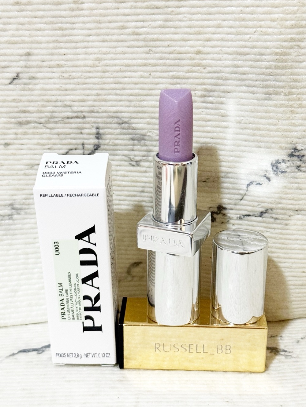 Prada Balm in U003 Wisteria Gleams PH Pinky Lilac Finish with Iridescent Shimmer